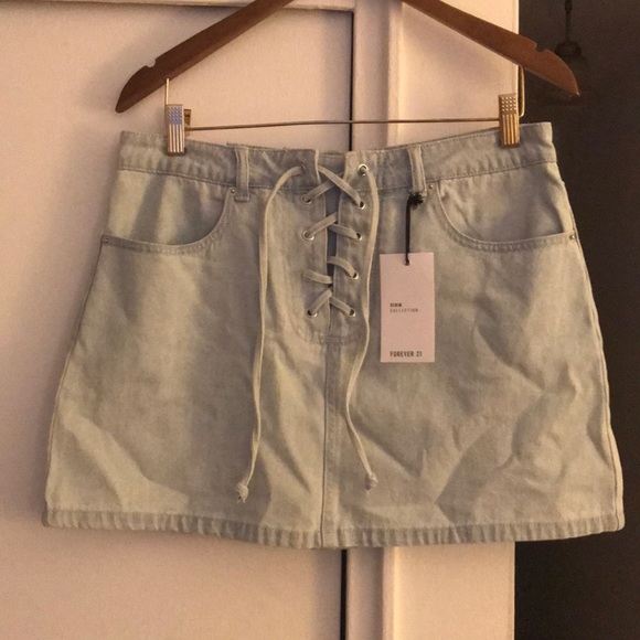 Forever 21 Dresses & Skirts - Forever 21 light denim lace up skirt sz 31